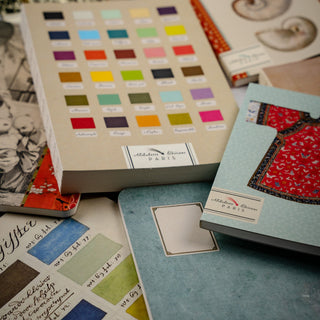 a selection of colourful notebooks