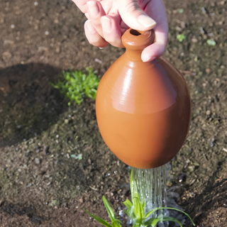 Thumb Watering Can